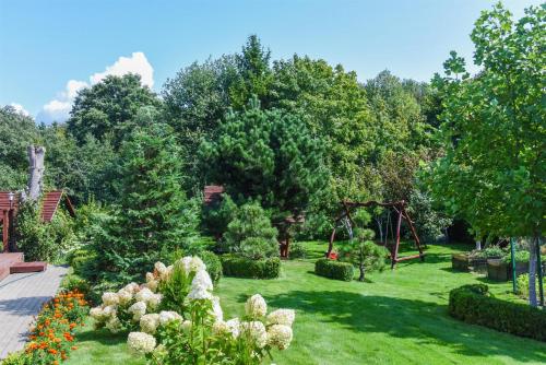 Κήπος έξω από το Villa Regina - Apartment Complex Resort in Šventoji