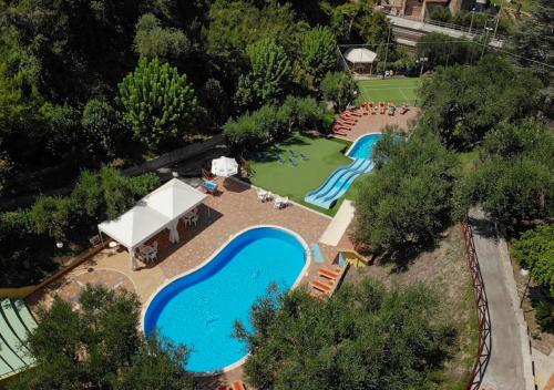 an overhead view of a swimming pool in a park at Residence Belvedere in Ascea