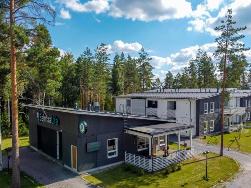 an aerial view of a house with a yard at Saimaa Life Apartments in Imatra