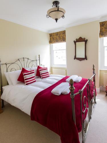 Кровать или кровати в номере The Portland Guesthouse
