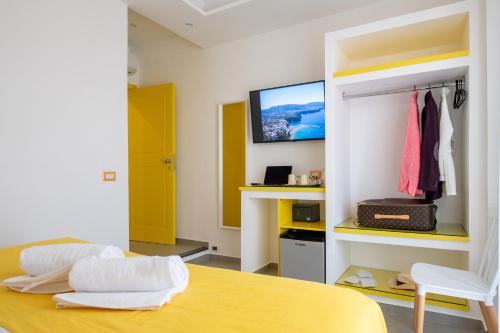 Postel nebo postele na pokoji v ubytování Al Campanile