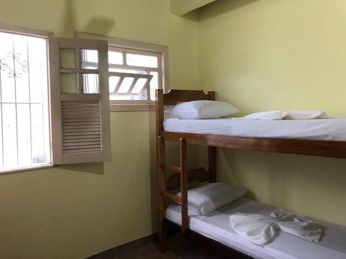Tempat tidur susun dalam kamar di Hostel Beach