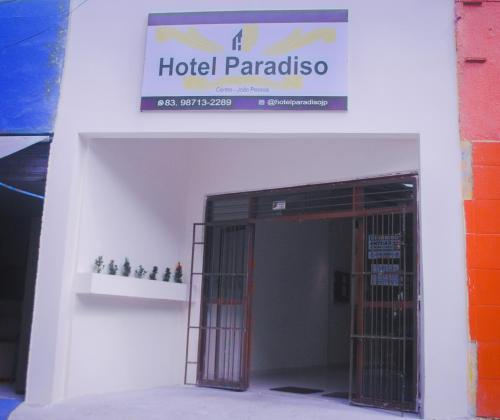 an entrance to a hotel paradaosa with a sign above it at Hotel Paradiso in João Pessoa