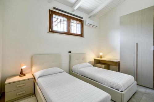 Łóżko lub łóżka w pokoju w obiekcie 6 bedrooms villa with private pool enclosed garden and wifi at Caiazzo