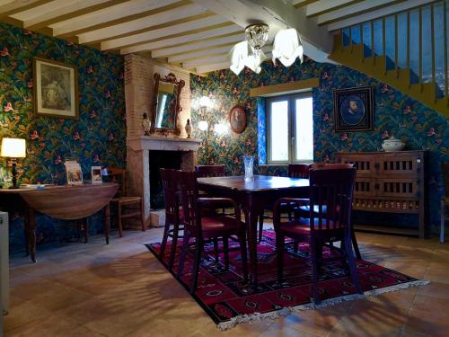 Posezení v ubytování Alfred et George - Le Gîte