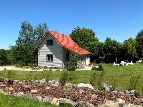 Un jardín fuera de Bliżej Ślęży Domki pod Ślężą