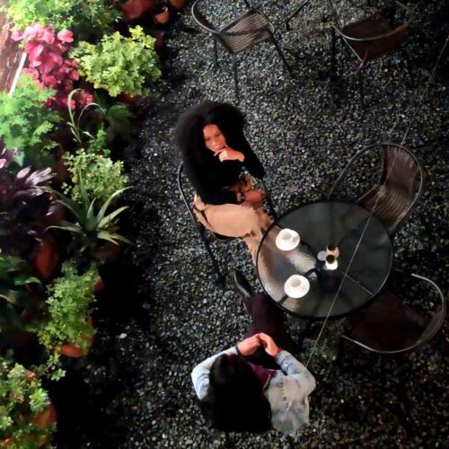 an overhead view of two people sitting around a table at El Caracol in Popayan