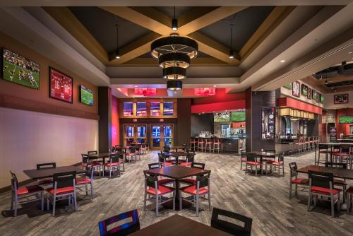 an empty dining room with tables and chairs at Wekopa Casino Resort in Fountain Hills