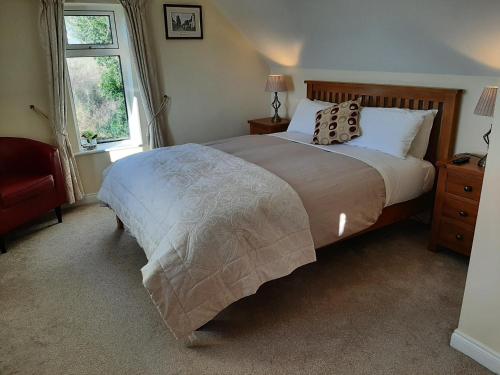 Tempat tidur dalam kamar di Channel View Bed & Breakfast