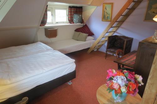 Postel nebo postele na pokoji v ubytování Villa Zomerdijk