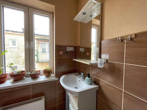 Phòng tắm tại Guest House Lviv