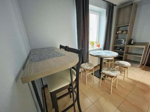 Kuchyň nebo kuchyňský kout v ubytování Guest House Lviv