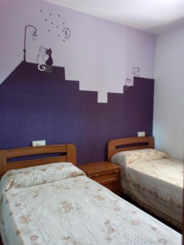 Llit o llits en una habitació de Alojamiento Monche La Loma