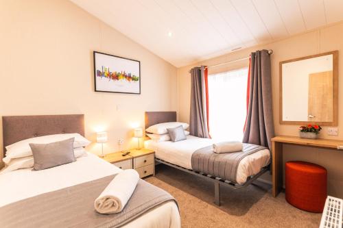 Imagen de la galería de Heathery Lodge with Hot Tub, en York