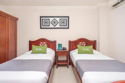 Cama o camas de una habitación en Hotel Costa Linda