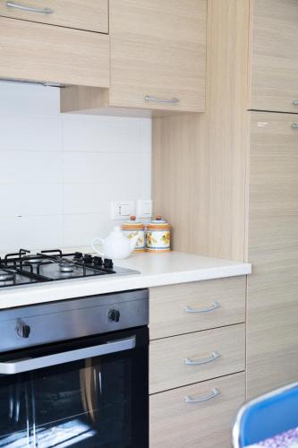 Kuchyň nebo kuchyňský kout v ubytování Villa Concettina