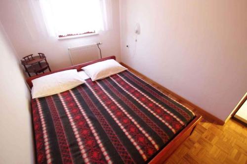 Posteľ alebo postele v izbe v ubytovaní Apartment in Novi Vinodolski 15435