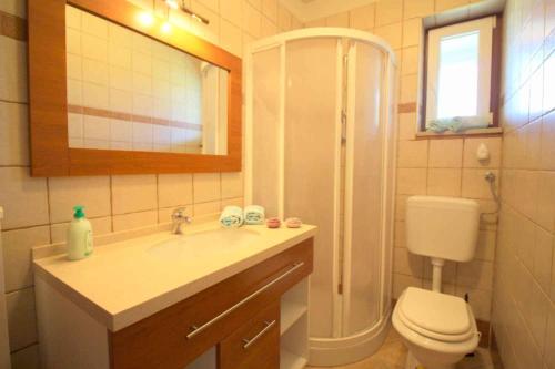 Et badeværelse på Apartment in Porec/Istrien 10034