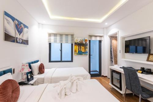 Un ou plusieurs lits dans un hébergement de l'établissement Hoang Trinh Hotel