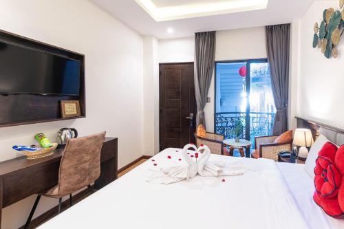 Un ou plusieurs lits dans un hébergement de l'établissement Hoang Trinh Hotel