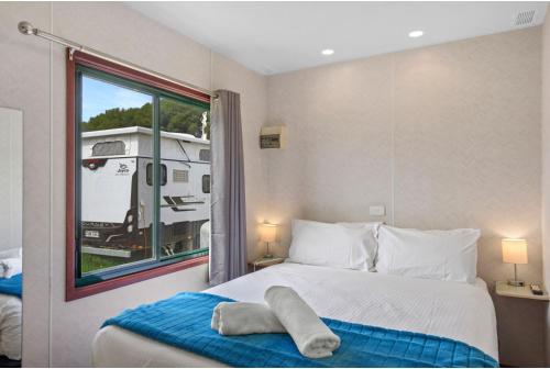 Postel nebo postele na pokoji v ubytování Discovery Parks - Goolwa