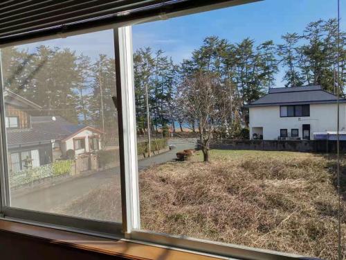 a view from a window of a house at 臨湖荘 in Takashima