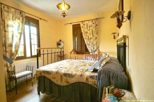 Posteľ alebo postele v izbe v ubytovaní Charming Villa in Ronda with Pool