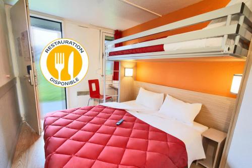 Ein Etagenbett oder Etagenbetten in einem Zimmer der Unterkunft Premiere Classe Toulouse Sud - Portet