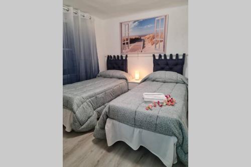 Een bed of bedden in een kamer bij La Casetta in Porta Soprana