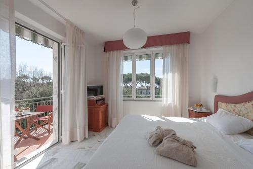 Postel nebo postele na pokoji v ubytování President Hotel