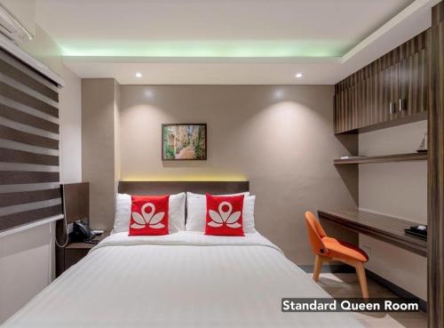 Ένα ή περισσότερα κρεβάτια σε δωμάτιο στο Hotel Inigo