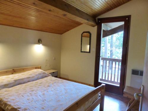 A bed or beds in a room at Villa Paloma Pour 8 Personnes