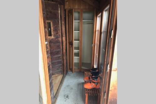a hallway of a house with the door open at Magic Ski-In-And-Out Chalet above Verbier in Bagnes