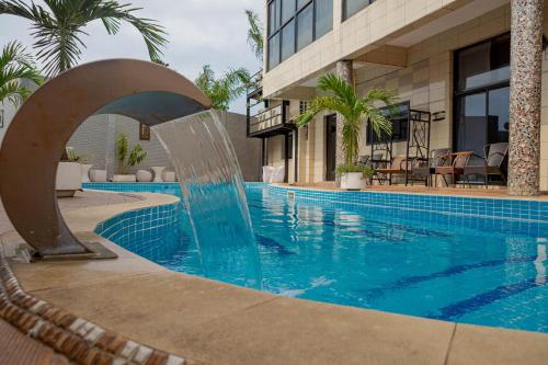 
The swimming pool at or near Hotel Hibiscus Louis
