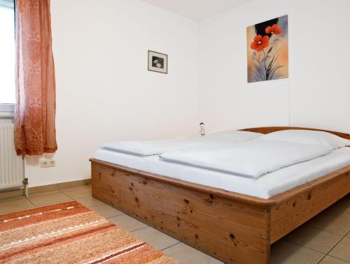 Katil atau katil-katil dalam bilik di Residenz am Yachthafen Strandaster
