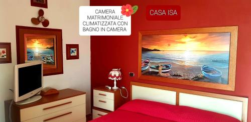 Televízia a/alebo spoločenská miestnosť v ubytovaní Casa Isa
