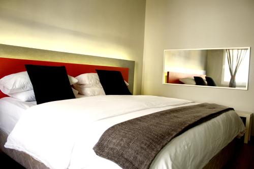 Cama ou camas em um quarto em Elite Residency