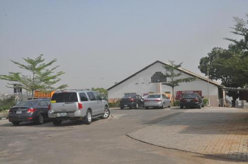 a group of cars parked in a parking lot at Nera Hotels in Jabi