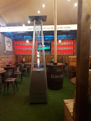 a gym with a swing in the middle of a restaurant at The Crown Pub & Guesthouse in London