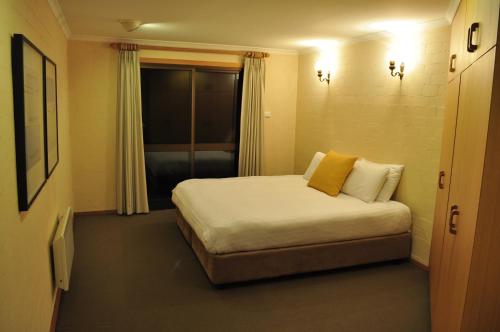 Krevet ili kreveti u jedinici u okviru objekta Salzburg Apartments