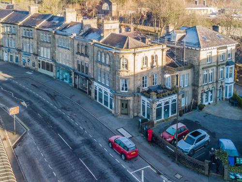 an aerial view of cars parked in front of a building at Crescent View in Buxton