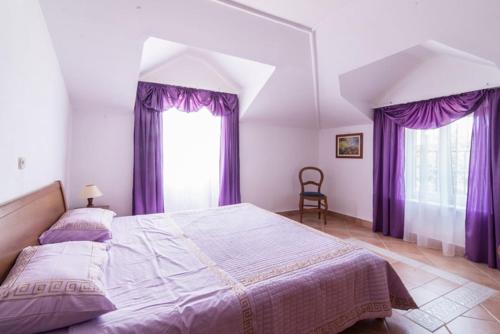 En eller flere senge i et værelse på Apartment Savudrija (123-4)