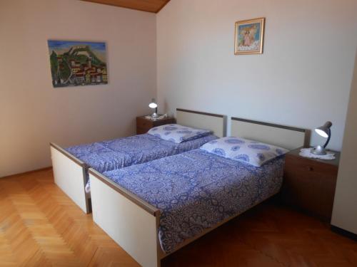 Posteľ alebo postele v izbe v ubytovaní Kuca Vodice (3420)