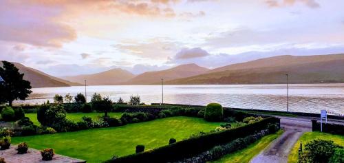 a view from a balcony overlooking a lake at Rudha-na-Craige in Inveraray