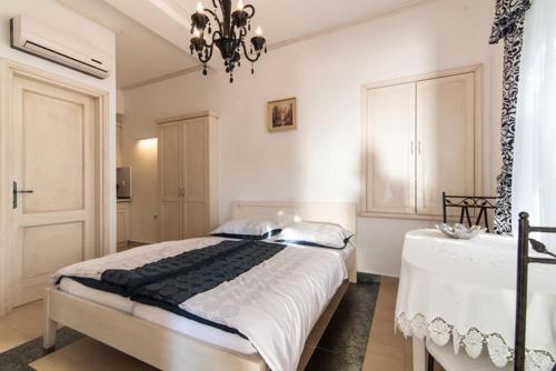 Postel nebo postele na pokoji v ubytování STUDIOAPARTMENT IUSAS-123-12