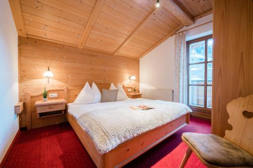 מיטה או מיטות בחדר ב-Der Erlenhof