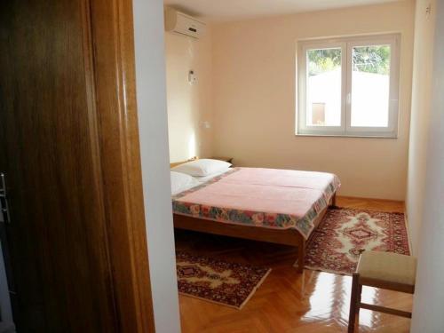 Posteľ alebo postele v izbe v ubytovaní Apartment in Duce with sea view, terrace, air conditioning, Wi-Fi (4166-2)