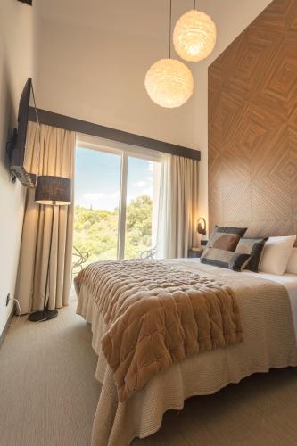 Postel nebo postele na pokoji v ubytování Hacienda Fresneda María by Real Spain Hotels Adults Recommended