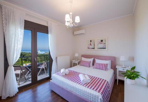 Postel nebo postele na pokoji v ubytování Villa Elisabeth View
