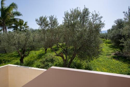 a view from the roof of a house with trees at Villa Elisabeth View in Plataniás